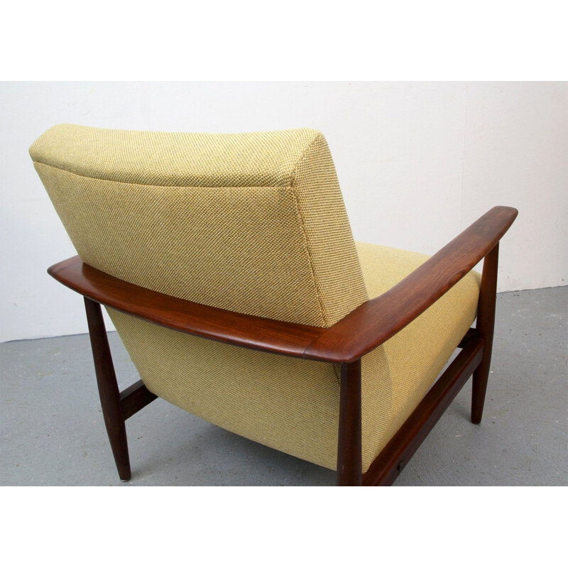 Armchair in dark teakwood  in yellow 1960s