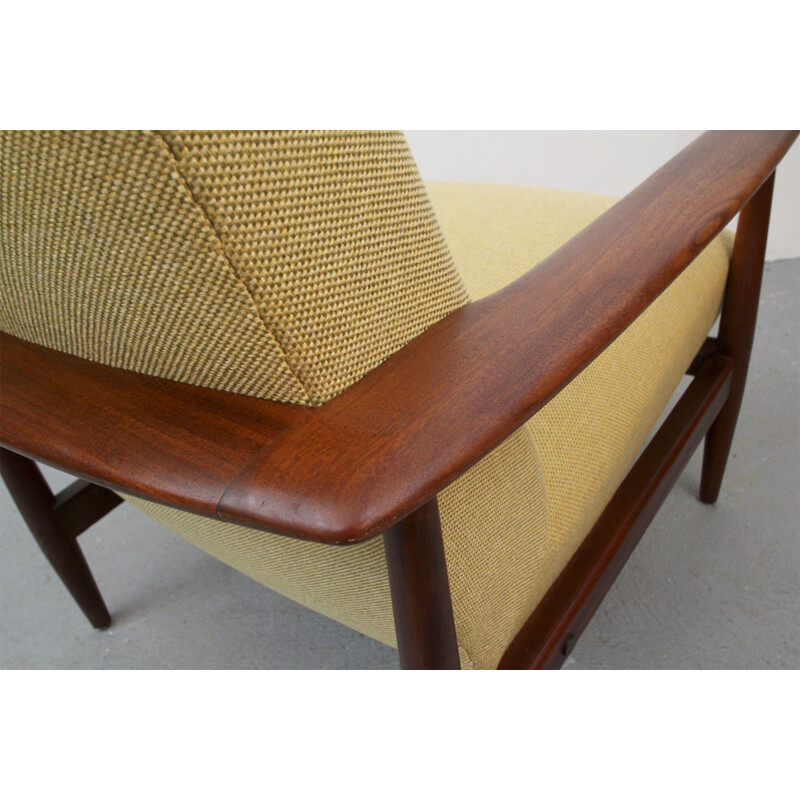 Armchair in dark teakwood  in yellow 1960s