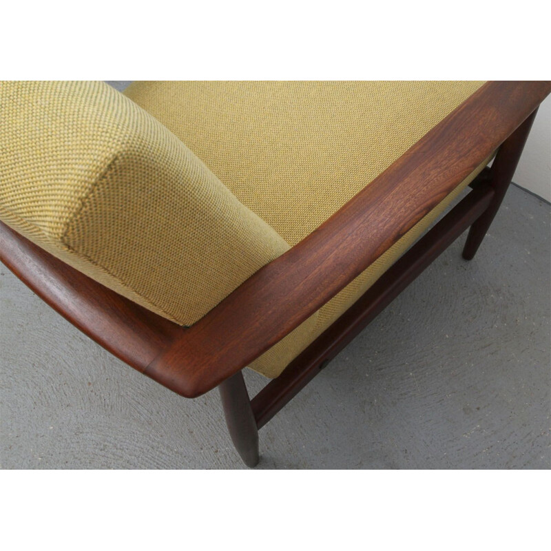 Armchair in dark teakwood  in yellow 1960s