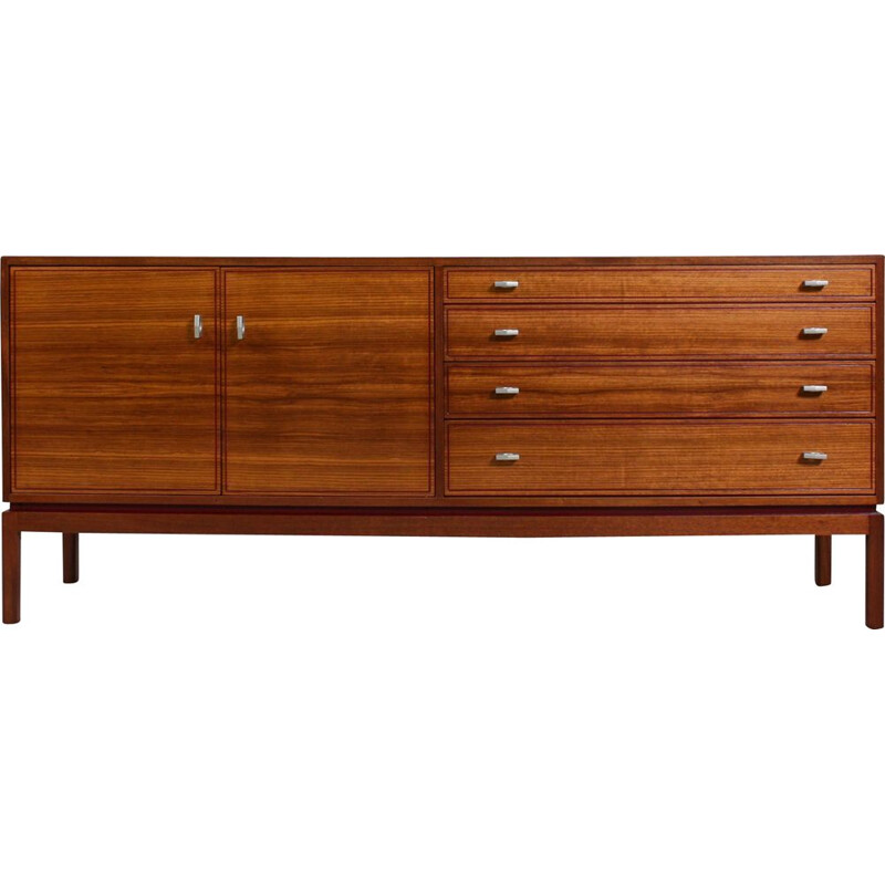  Vintage English sideboard, made from teak and features 1960s