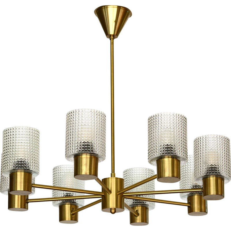 Brass eight arm chandelier with glass shades by HJA. Sweden 1960s