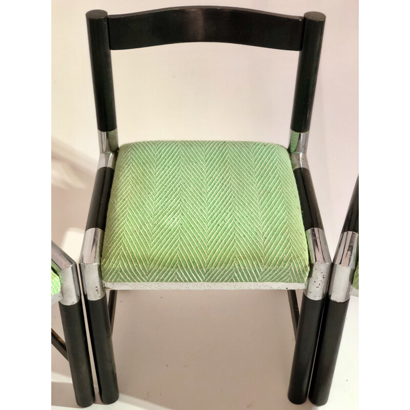 Suite de 4 chaises vintage avec pieds tubulaires et assise en tissus