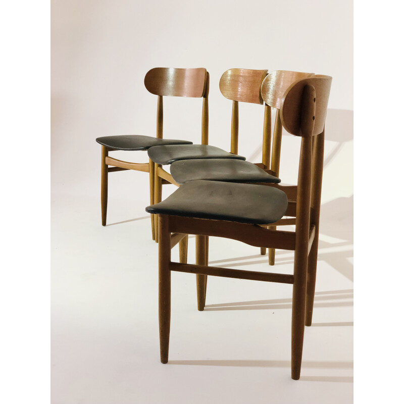 Suite of 4 vintage Scandinavian teak chairs and black leatherette