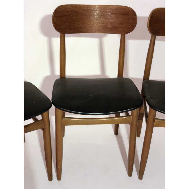 Suite de 4 chaises vintage scandinave en teck et assise en Skaï noir