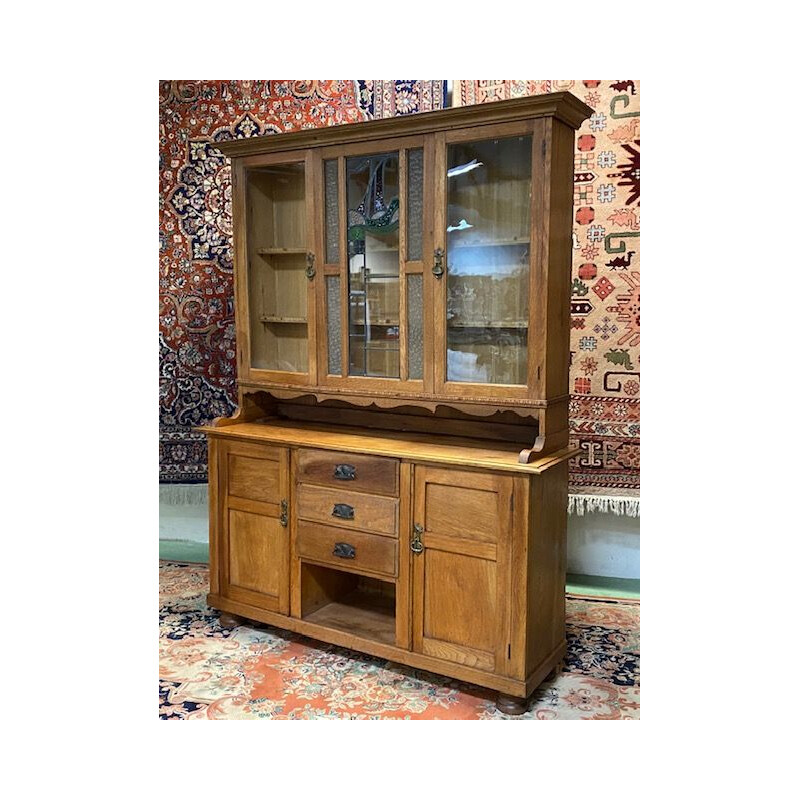 Early 20th century English china cabinet in blond oak