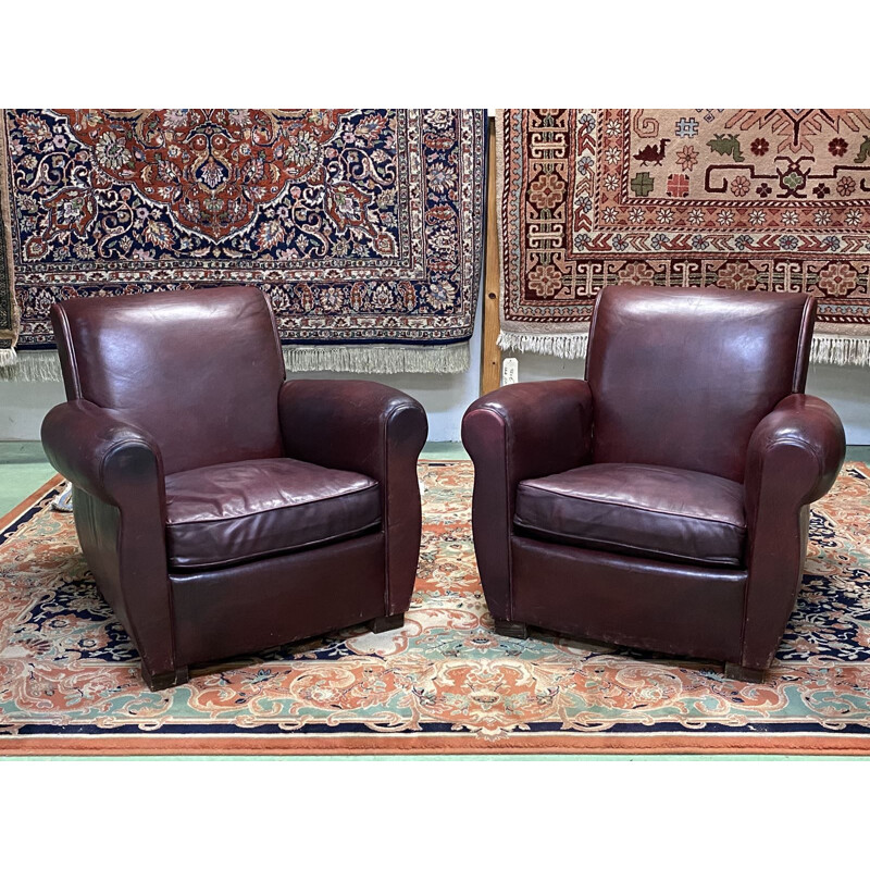 Pair of vintage burgundy leather club chairs 1950's