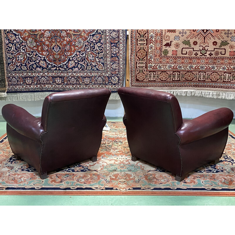 Pair of vintage burgundy leather club chairs 1950's