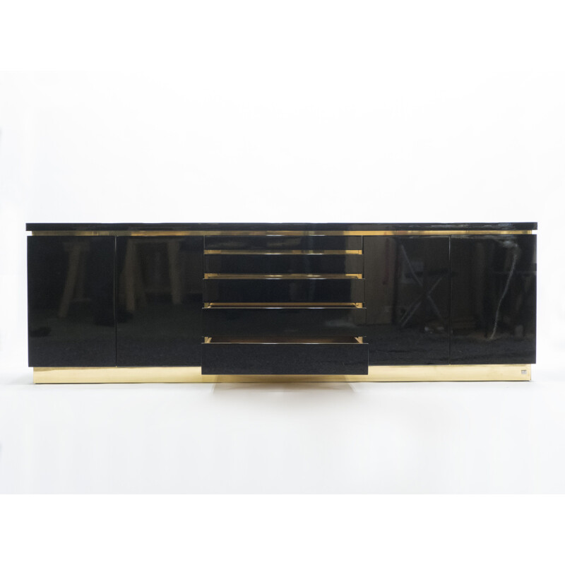 Black and brass lacquered stringcourse signed J.C. Mahey 1970