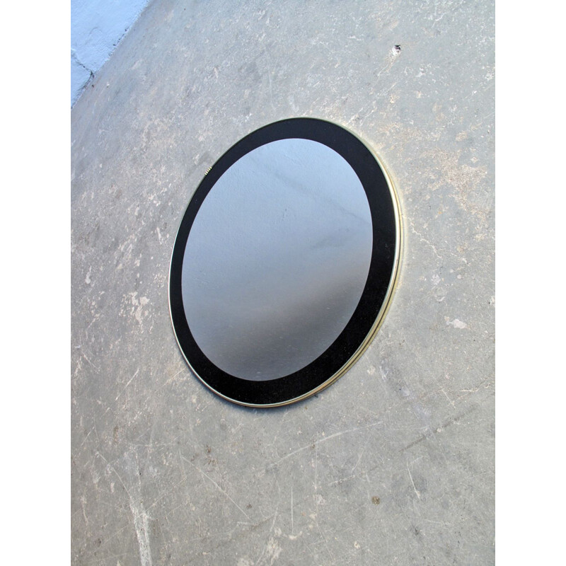 Vintage round mirror with black frame 1960
