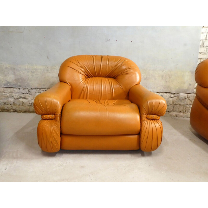 Vintage tawny leather armchair with braided side band 1970