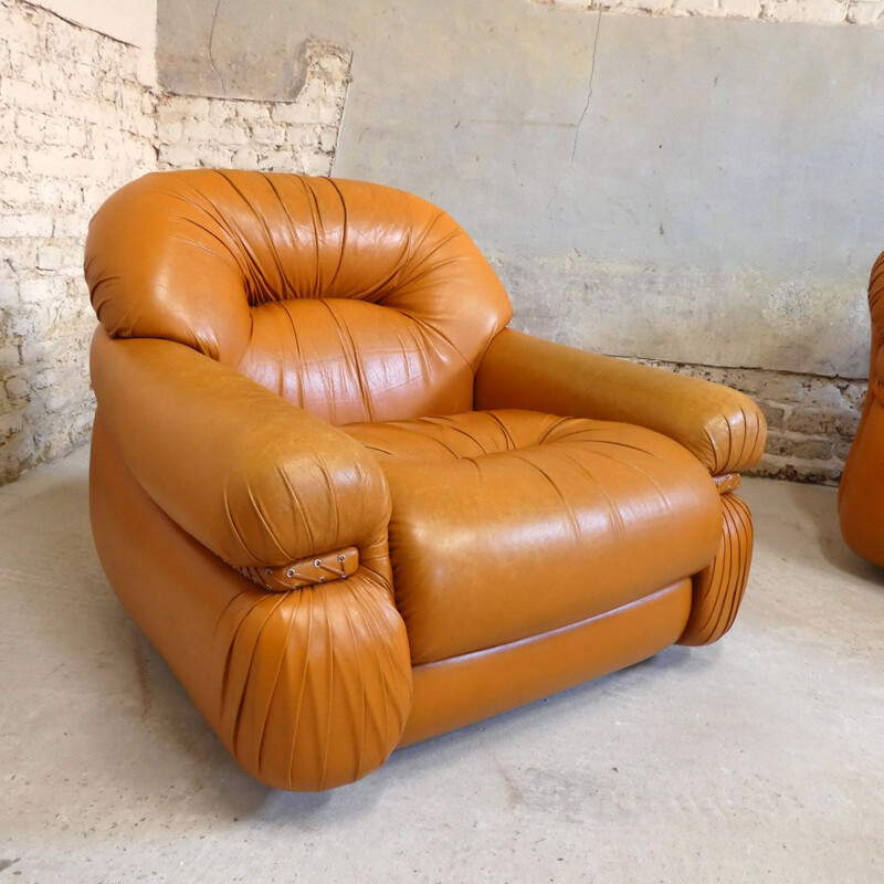 Vintage tawny leather armchair with braided side band 1970