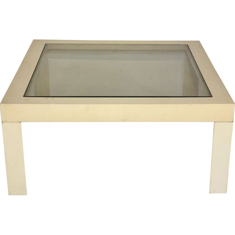 White plastic coffee table with glass top