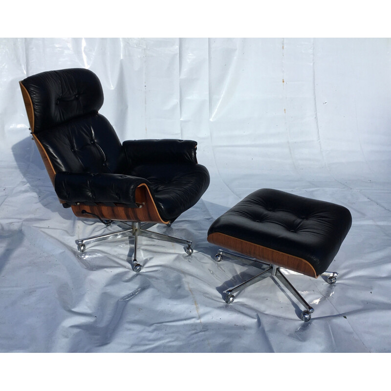 Vintage leather and rosewood armchair and ottoman 1960