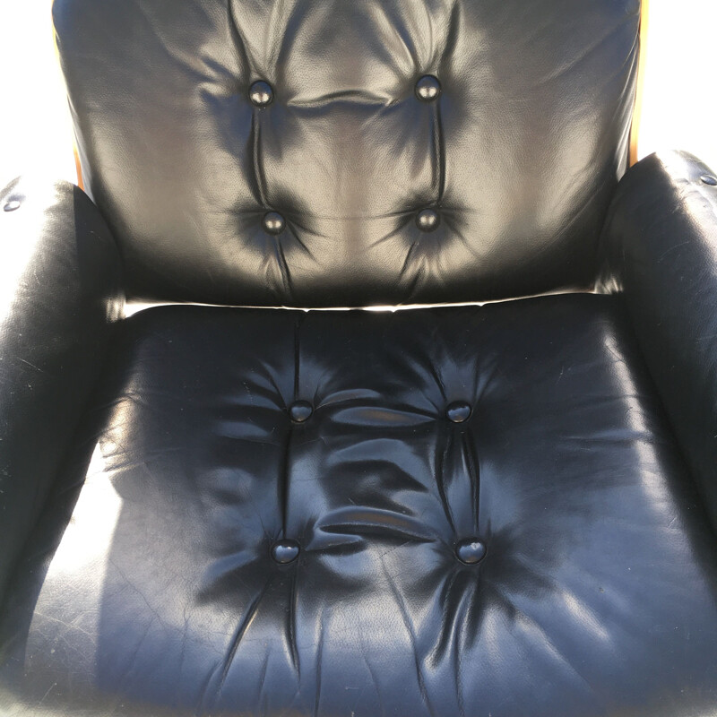 Vintage leather and rosewood armchair and ottoman 1960