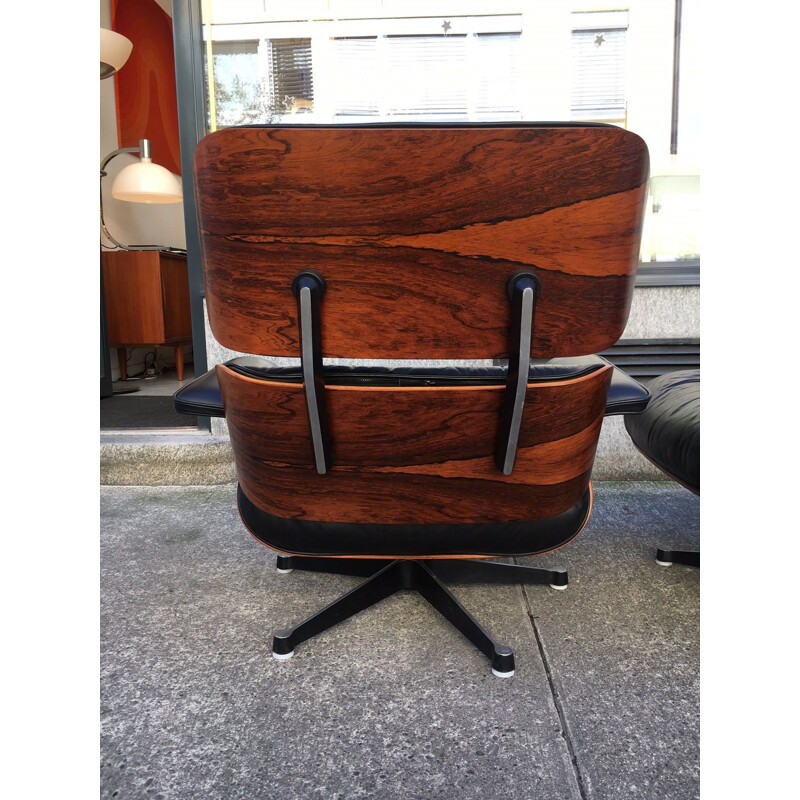 Pair of Lounge Chair by Charles and Ray Eames in Rosewood and black leather 1975