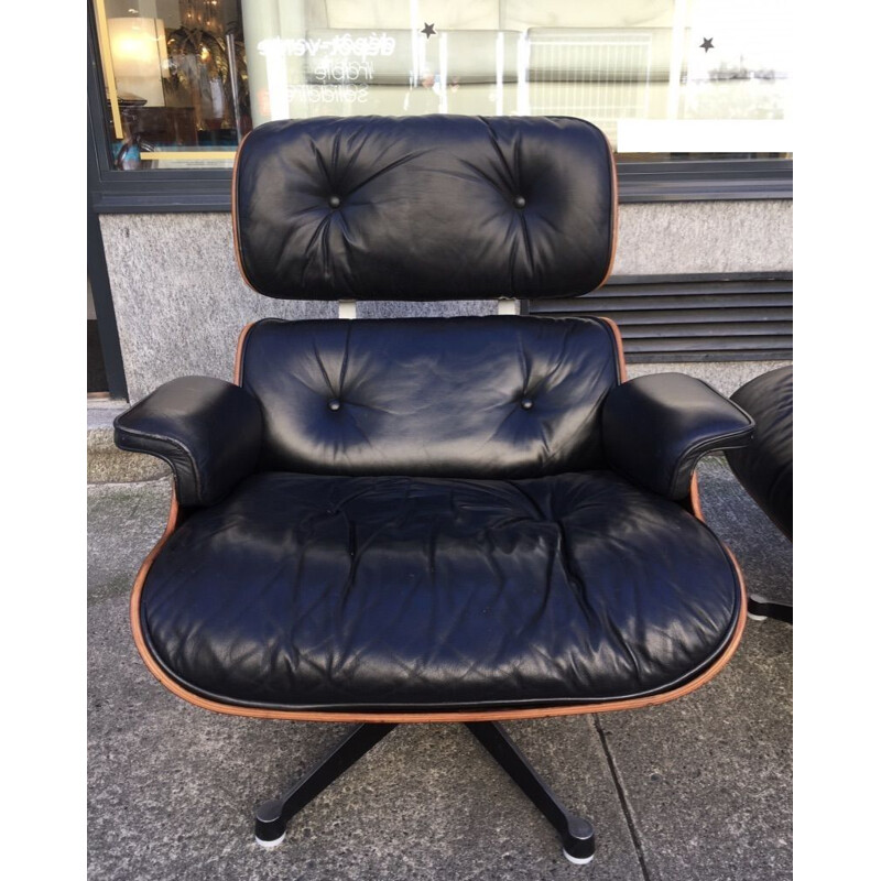 Paire de Lounge Chair vintage par Charles et Ray Eames en Palissandre et cuir noir 1975