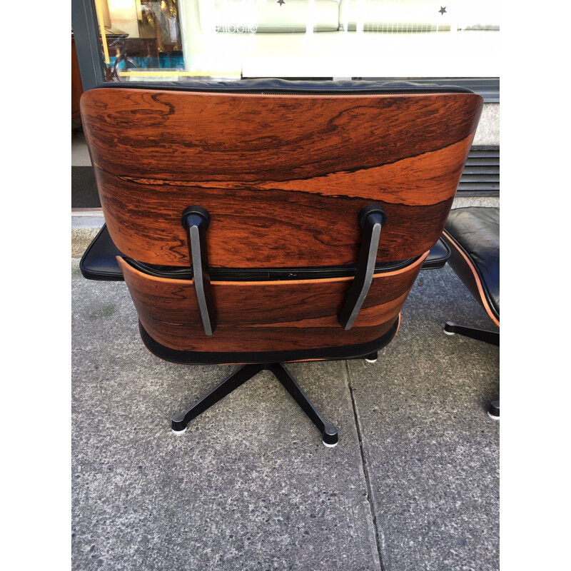 Pair of Lounge Chair by Charles and Ray Eames in Rosewood and black leather 1975