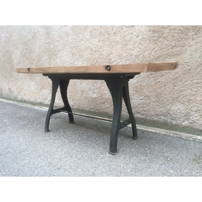 Vintage industrial workshop table with cast iron base, 1910