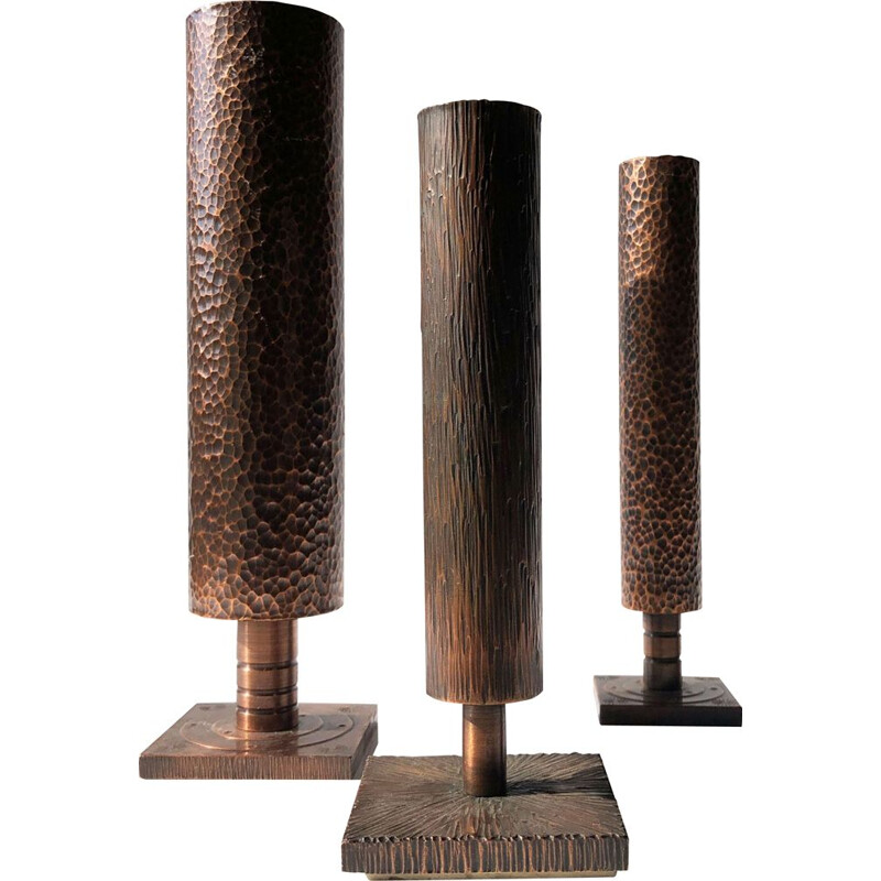 Set of 3 brutalist hammered bronze soliflores vases. France 1970