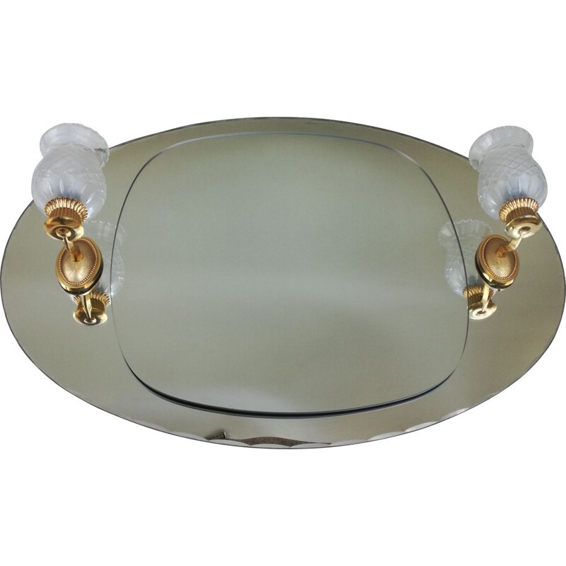 Vintage oval and luminous mirror 