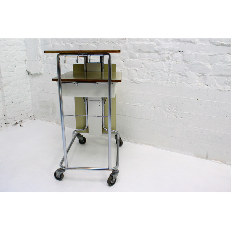 Vintage hospital trolley on wheels