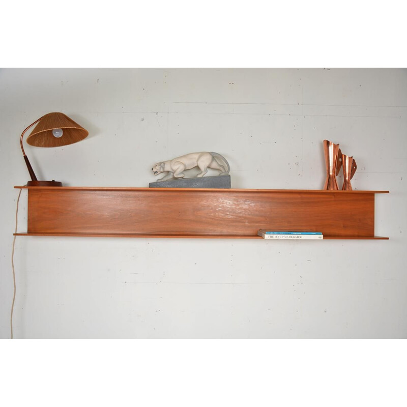 Vintage teak wall shelf by Wilhelm Renz. Dated 1960 