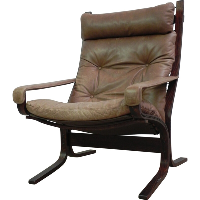 "Siesta" lounge chair in wood and brown leather - 1960s