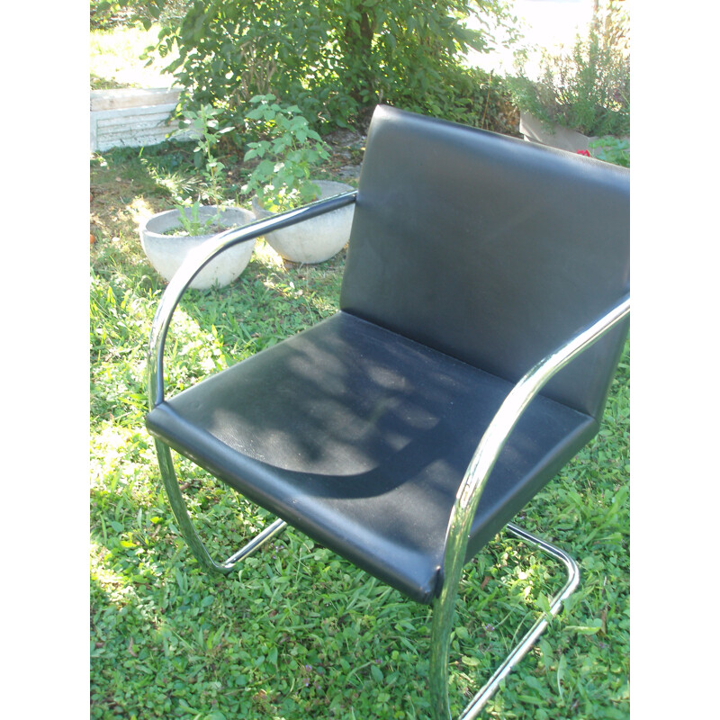 Pair of vintage leather and chrome armchairs