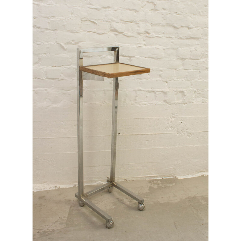 Vintage industrial telephone table on wheels