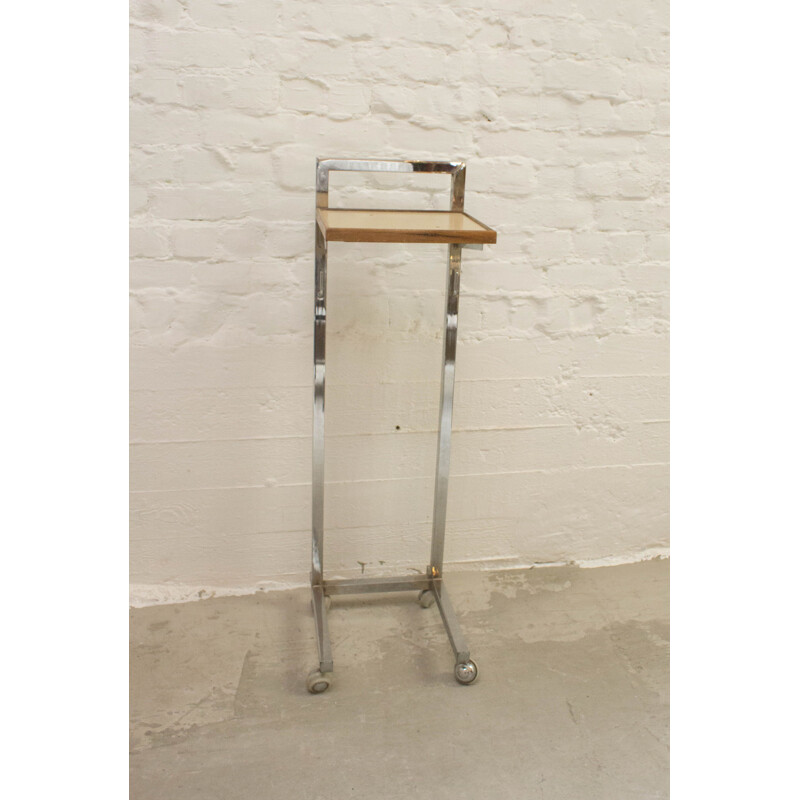 Vintage industrial telephone table on wheels