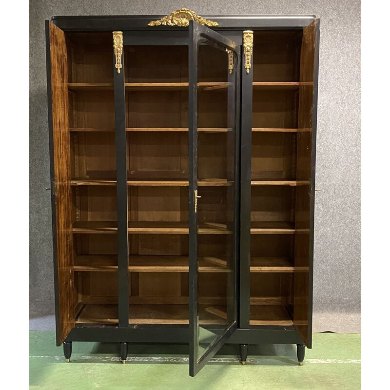 Vintage bookcase in matte black patina oak and bronze