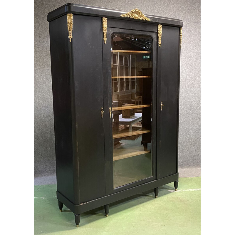 Vintage bookcase in matte black patina oak and bronze