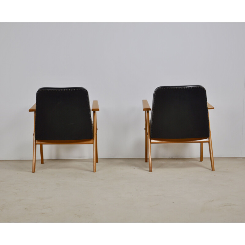 Pair of Model 366 Easy Chairs in black leather by Jozef Chierowski 1960s