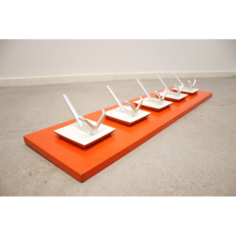 Vintage orange coat rack with 5 white hooks 1960