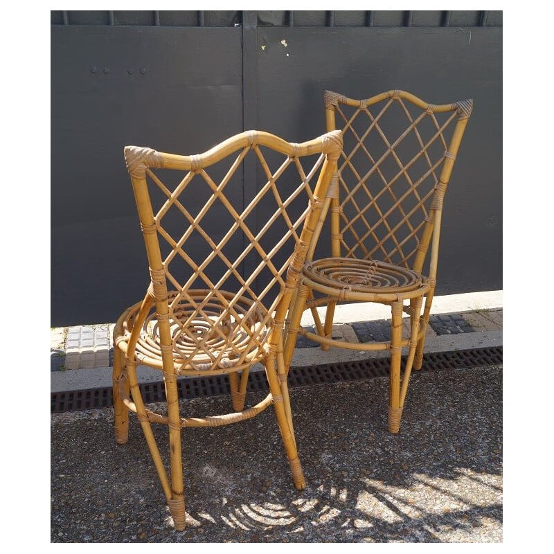 Pair of vintage rattan chairs Louis Sognot
