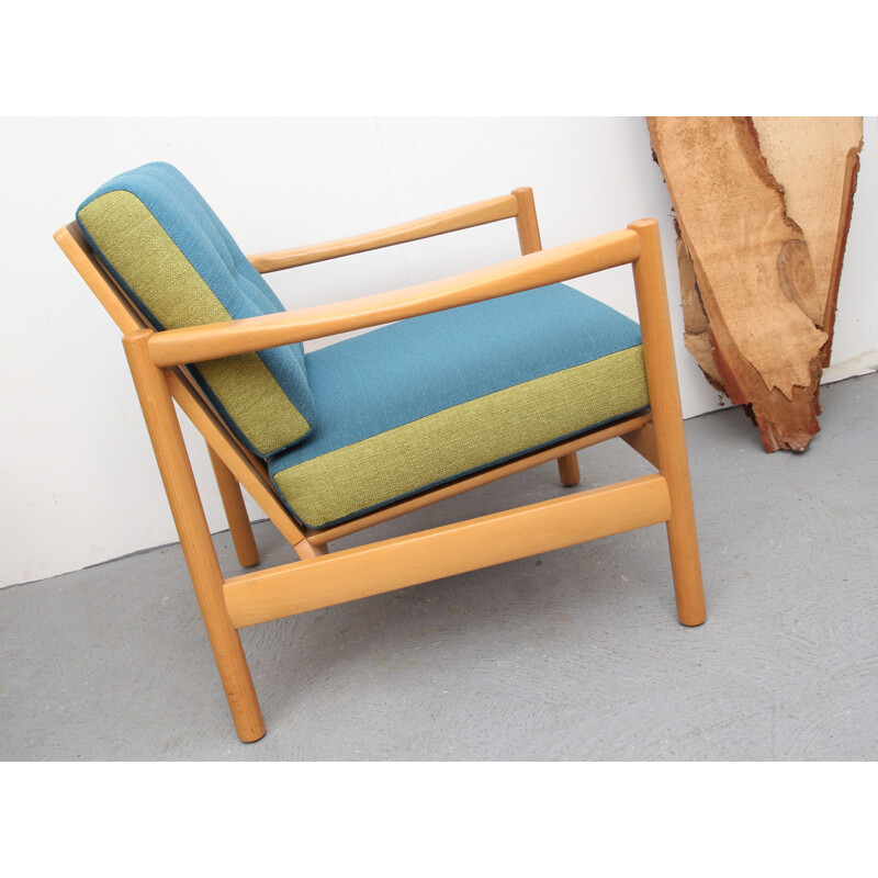 Vintage fauteuil in massief glanzend hout en blauwe en groene stof, 1960