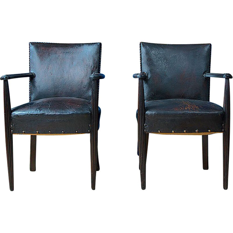 Pair of carved leather library chairs Louis XV of the 19th century