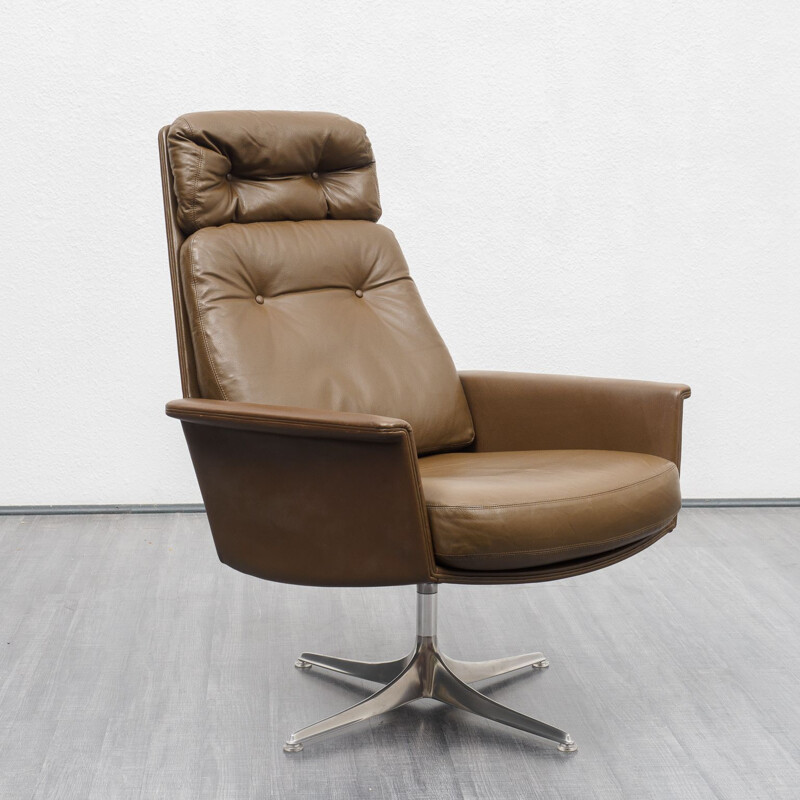 Vintage leather lounge chair with foot stool, COR, design Horst Brüninge dit Artikel 1960s 