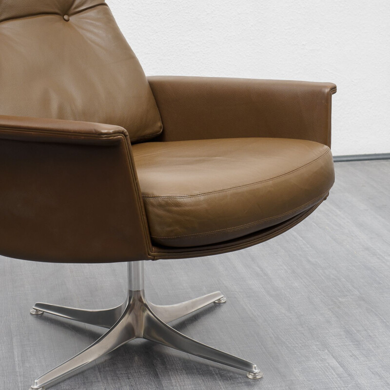 Vintage leather lounge chair with foot stool, COR, design Horst Brüninge dit Artikel 1960s 