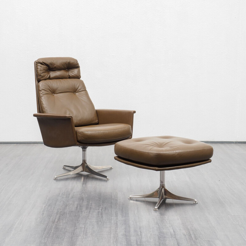 Vintage leather lounge chair with foot stool, COR, design Horst Brüninge dit Artikel 1960s 