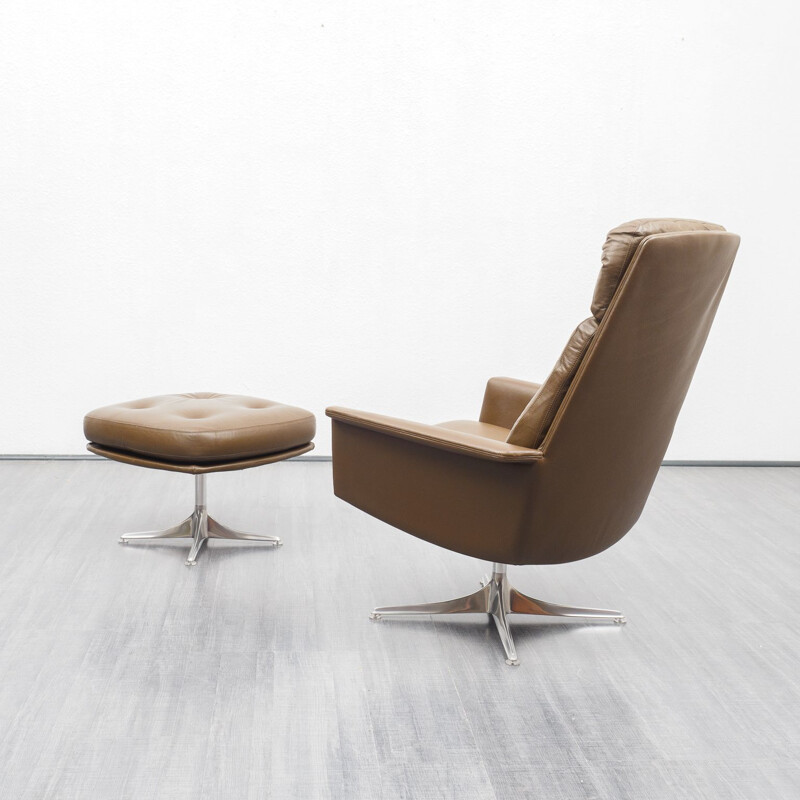 Vintage leather lounge chair with foot stool, COR, design Horst Brüninge dit Artikel 1960s 