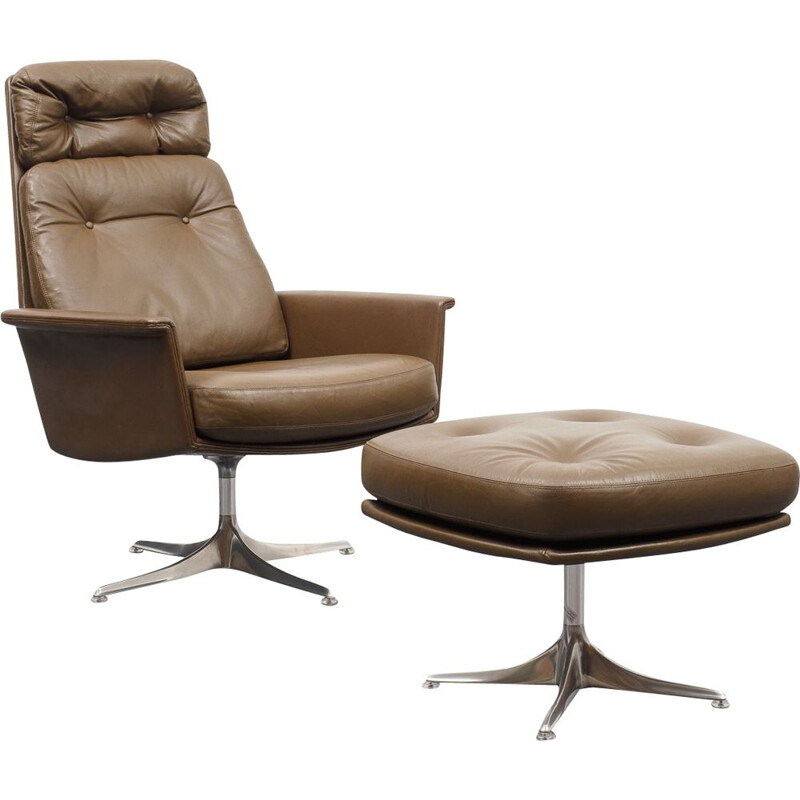 Vintage leather lounge chair with foot stool, COR, design Horst Brüninge dit Artikel 1960s 