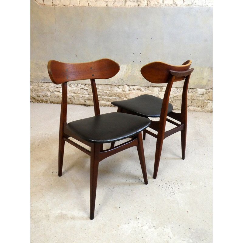 Vintage teak chair with sculptural backrest