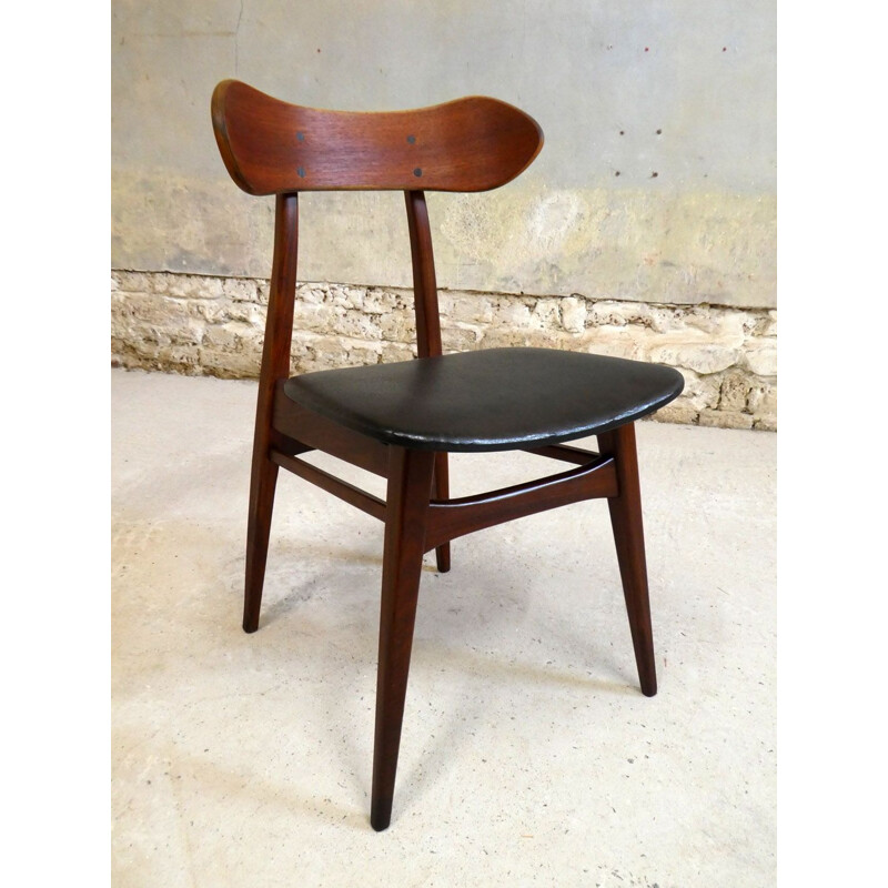 Vintage teak chair with sculptural backrest