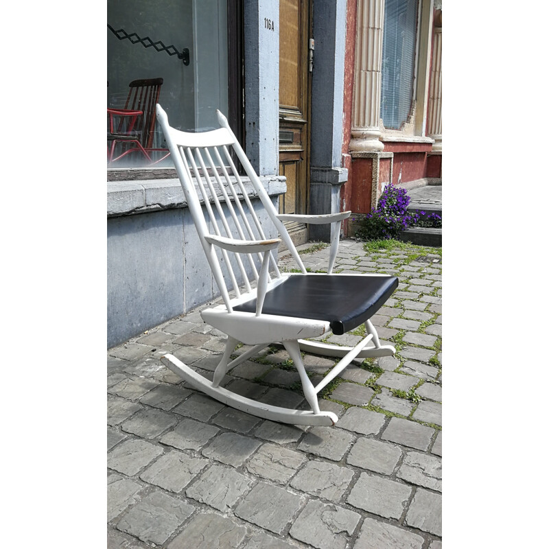 Vintage rocking chair in wood and dark blue imitation leather