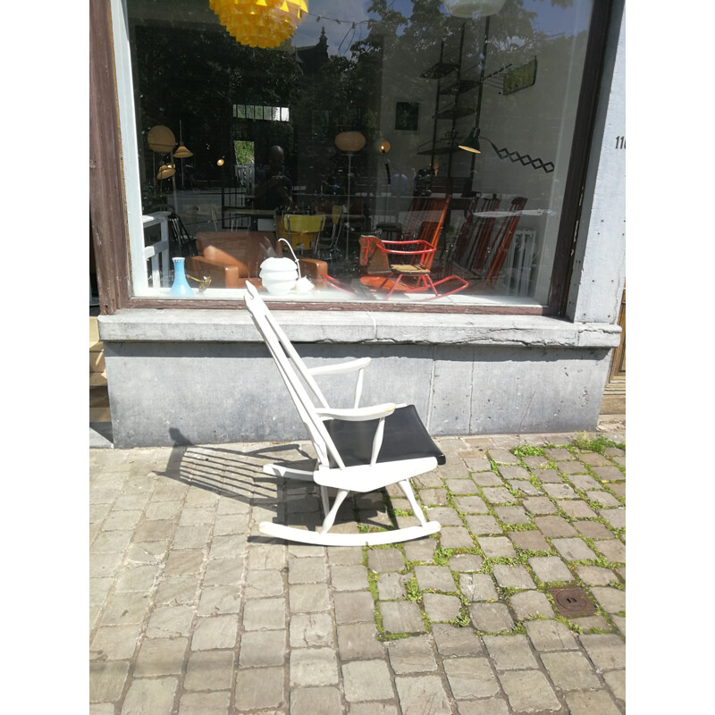 Vintage rocking chair in wood and dark blue imitation leather