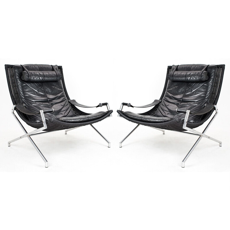 Pair of vintage lounge chairs  Gerard van den Berg in black leather and wicker 1970s