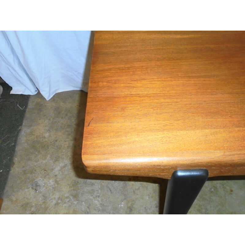Vintage extensible teak table with black lacquered legs 1960