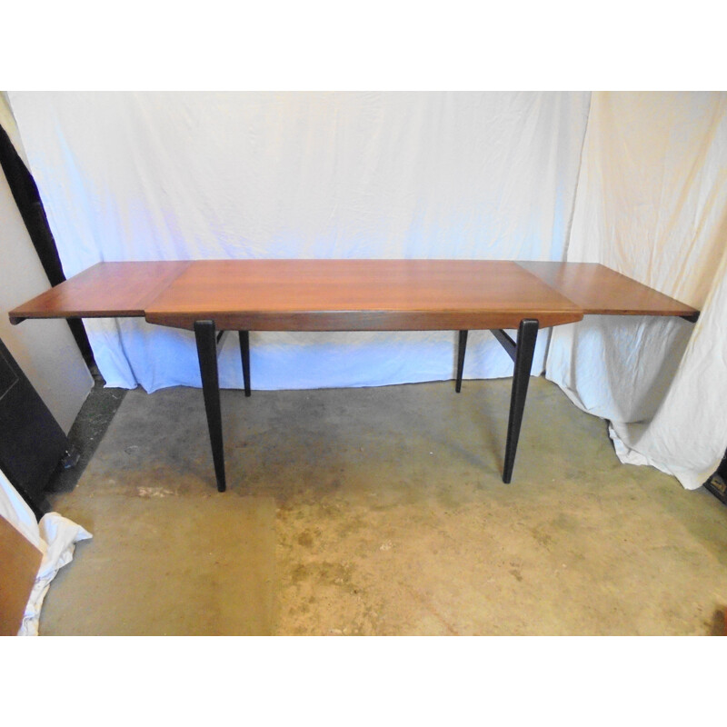 Vintage extensible teak table with black lacquered legs 1960