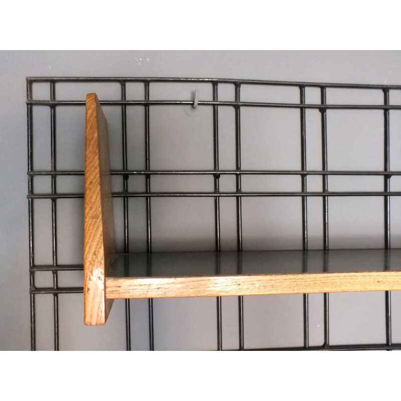 Vintage black lacquered iron wall bookcase with five adjustable shelves from the PFR studio by Gio Ponti, 1950